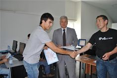 Professor Boris Japarov (centre) and KazRENA's instructor Talgat Nurlybayev (right) with training attendees from Kazakhtelecom Professor Boris Japarov (centre) and KazRENA's instructor Talgat Nurlybayev (right) with training attendees from Kazakhtelecom