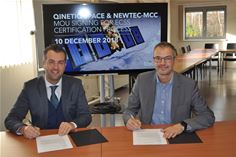 Thomas Van den Driessche, CEO, Newtec and Erik Masure, Managing Director, QinetiQ Space Belgium sign an MoU for ECCS Certification process