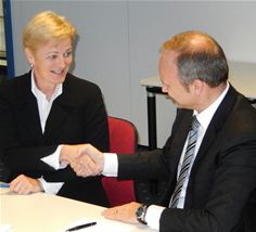 Director General of European Broadcasting Union (EBU), Ingrid Deltenre agreeing with CEO of Newtec, Serge Van Herck, on future cooperation