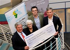 (From left to right) Ark Cancer Centre Charity trustees Merv Rees and Sandra Fell are presented with the £500,000 match-funding cheque by Ed Gairdner, chief operating officer of The Good Exchange, and Chris Boulton, chief executive officer of Greenham Trust. (From left to right) Ark Cancer Centre Charity trustees Merv Rees and Sandra Fell are presented with the £500,000 match-funding cheque by Ed Gairdner, chief operating officer of The Good Exchange, and Chris Boulton, chief executive officer of Greenham Trust.