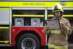 A demountable Panasonic TOUGHBOOK 33 device in use with fire service workers