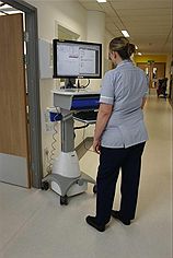 Nurse using new electronic patients record system Nurse using new electronic patients record system