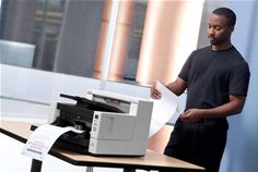 Kodak i4000 Plus Series scanner in use Kodak i4000 Plus Series scanner in use