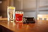 W995 on table, with drinks